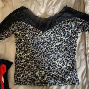 Express snow leopard top with mesh shoulders